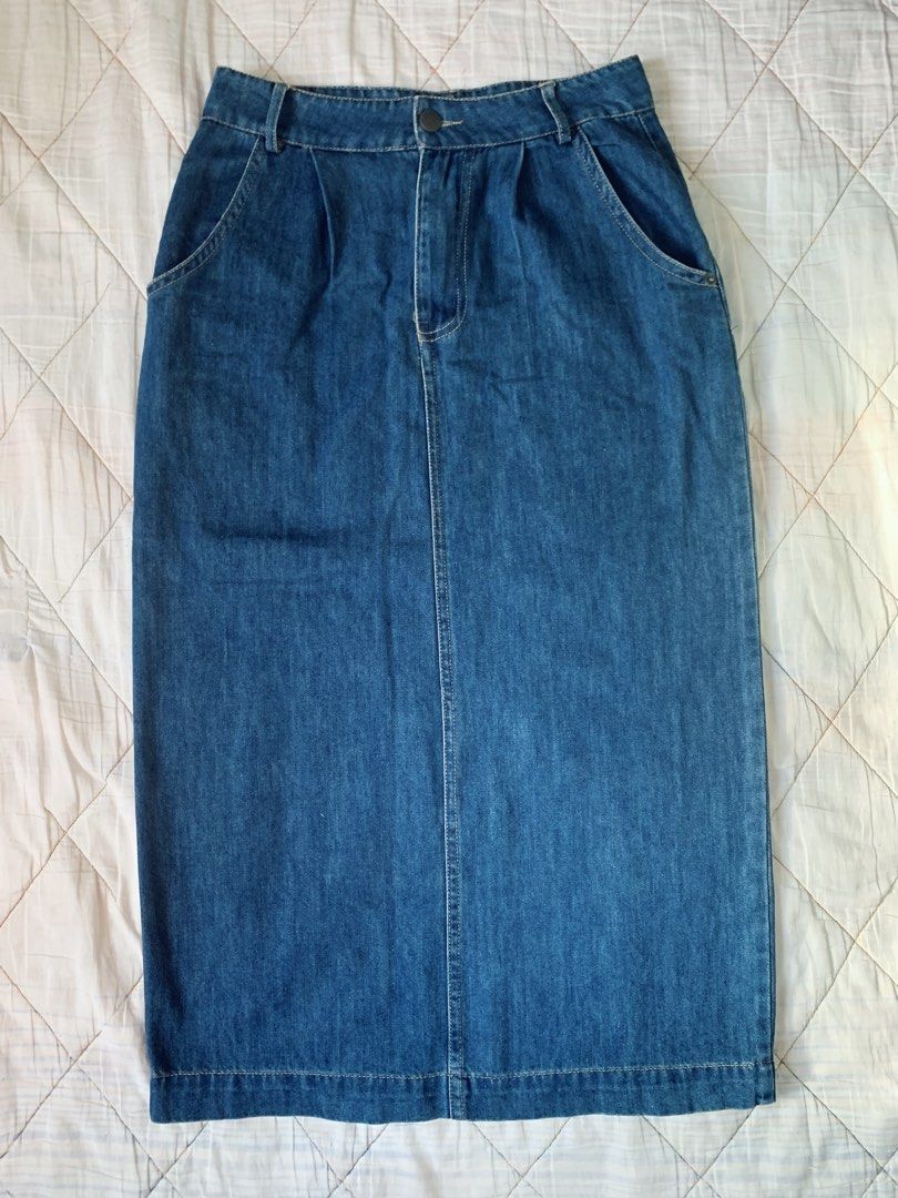 Blue Denim Midi Skirt with Back Slit (Category: Skirts) located in Bacoor. Submitted by krisery (Listing ID 1467949529, Image 1). Description: - Style: Mid-length denim skirt in a classic medium denim blue - Fit: High-waisted with front button closure and belt loops - Size: M on tag - Waist: 26 inch - Length: 30.5 inch - Fabric: Soft Denim (Lightweight/Non-stretch) - 2 Back and 2 Side Pockets - Condition: Excellent/No Damage - Not Faded color - G
