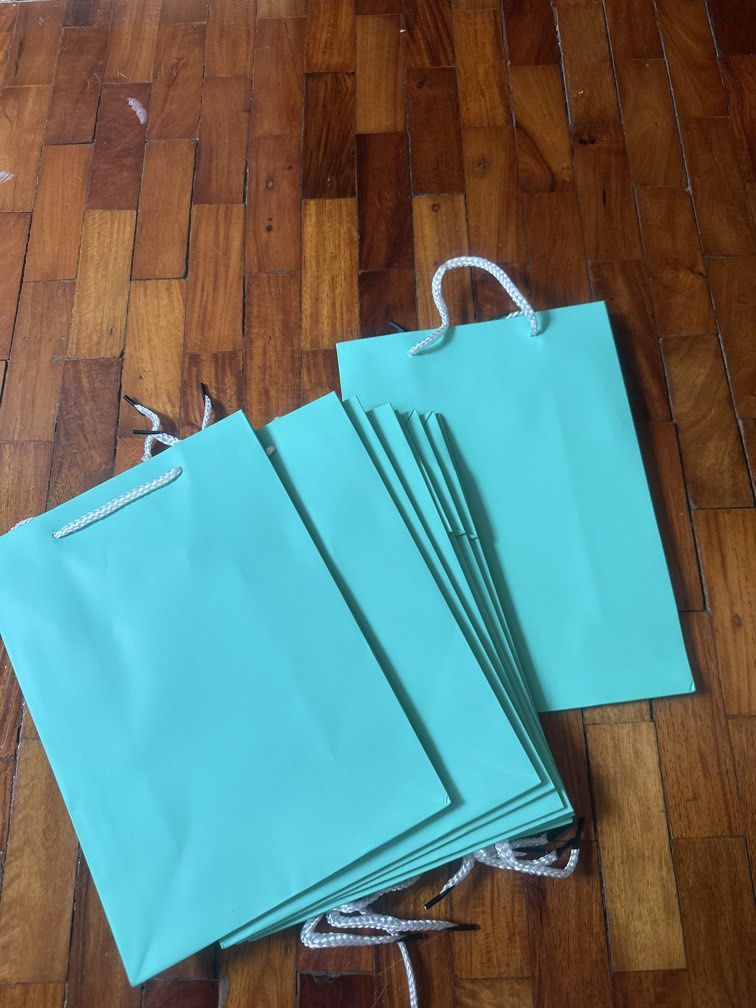 Blue Paper Gift Bag (Category: Occasions & Party Supplies) located in Manila. Submitted by knoxarbatt (Listing ID 1467851903, Image 1). Description: Size: 28*20*10cm Reason for selling: I accidentally bought in bulk but I only needed 1 😓 Price: 25 PHP EACH Can do meetups and delivery via lalamove!.