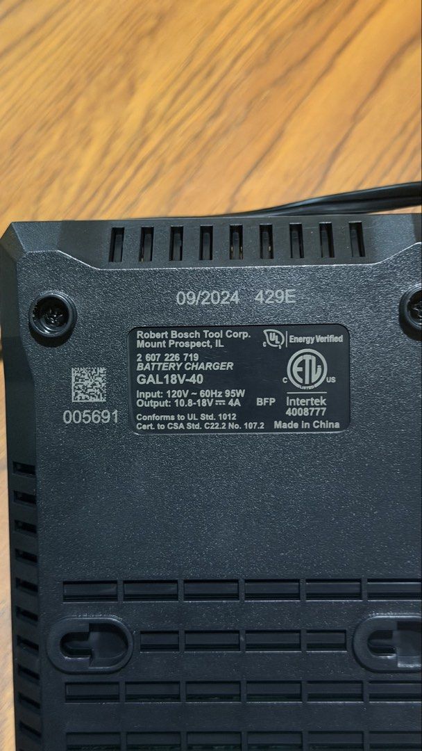 Bosch GAL18V-40 18V Battery Charger (Category: Construction Tools & Equipment) located in Cebu City. Submitted by eynjlin (Listing ID 1468017610, Image 2). Description: - Model: Bosch GAL18V-40 Battery Charger - Compatibility: Works with 10.8V to 18V batteries (AmpShare compatible) - Power: 120V input, 4A output - Condition: Clean, tested, and ready for use - Includes: Attached power cord with protective caps on the plug prongs.