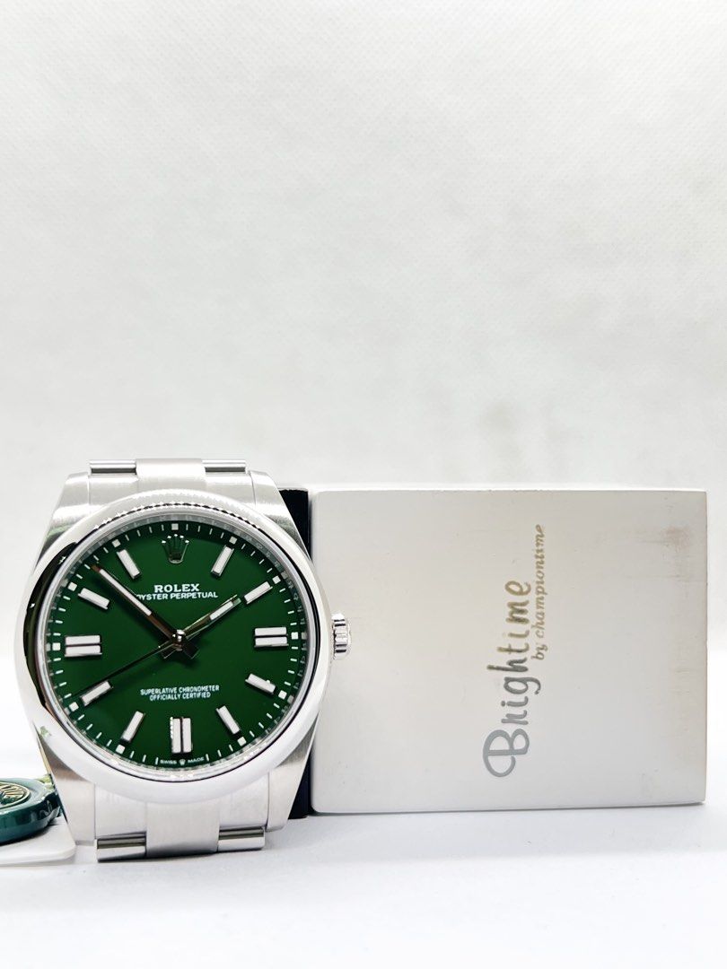 Brand New Rolex Oyster Perpetual 41 124300 Green Dial Automatic Steel Casing Bracelet ( NOS, July 22 ) (Category: Watches) located in Singapore. Submitted by brightime (Listing ID 1467928366, Image 3). Description: Brand New Rolex Oyster Perpetual 41 124300 Green Dial Automatic Steel Casing Bracelet ( NOS, July 22 ) ** Brand New ** ** New Old Stock ** ** Stickers Removed By AD ** Model : 124300 Also known as : Oyster Perpetual 41 Case size : 41mm