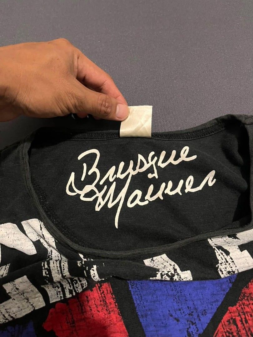 Brave Man Black Graphic Tee Union Jack Size L (Category: Tshirts & Polo Shirts ) located in Pasacao. Submitted by kakiethriftapparel01217 (Listing ID 1467971040, Image 3). Description: - Color: Black - Size: Large - Material: 100% Cotton, comfortable fit - Design: Large distressed Union Jack graphic print on the front - Details: 'CERTAIN' printed at the top, 'HEART WARM REVOLUTION' at the bottom - Branding: Brand signature printed inside the coll