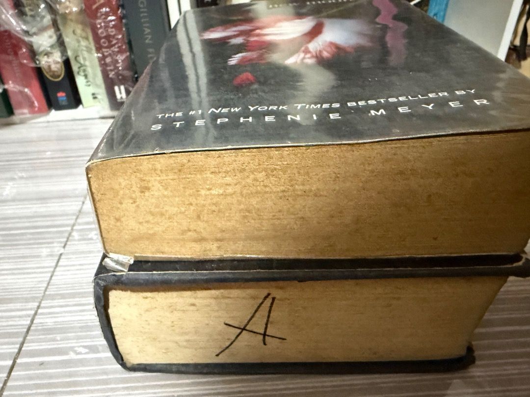Breaking Dawn Stephenie Meyer Hardbound Book (Category: Storybooks) located in Angeles City. Submitted by yanaa0899 (Listing ID 1467867442, Image 3). Description: READ FIRST! THIS IS A PROJECT BOOK!! If you want to spray paint or revive the book condition this is perfect for you. May value padin ito kasi hardbound. Title:Breaking by Stephenie Meyer + FREE New Moon Paperback (heavy foxing) - Edition: Hardbound - Condition: Cover has minor edge wea