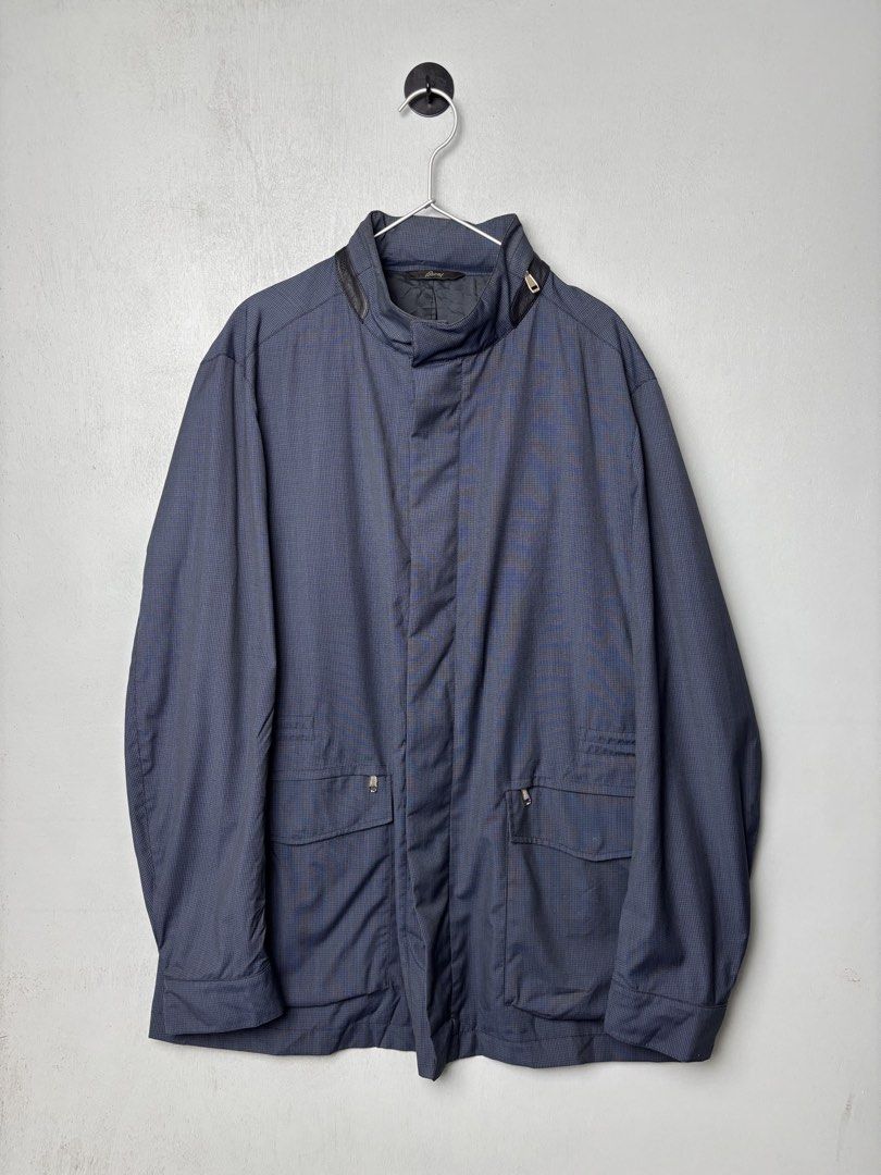 Brioni - Virgin Wool Jacket (Category: Coats, Jackets and Outerwear) located in Mandaluyong City. Submitted by fellas_ph (Listing ID 1467951796, Image 3). Description: Long virgin wool jacket with stand-up collar, hidden hood, four front pockets, invisible zip and button fastening, snap cuffs, internal drawstring waist and one internal zip pocket. Excellent condition No issues Size XL 2,698 Euro Sold Price (189k+ php) 24" Width 32.5" Length 19.5"