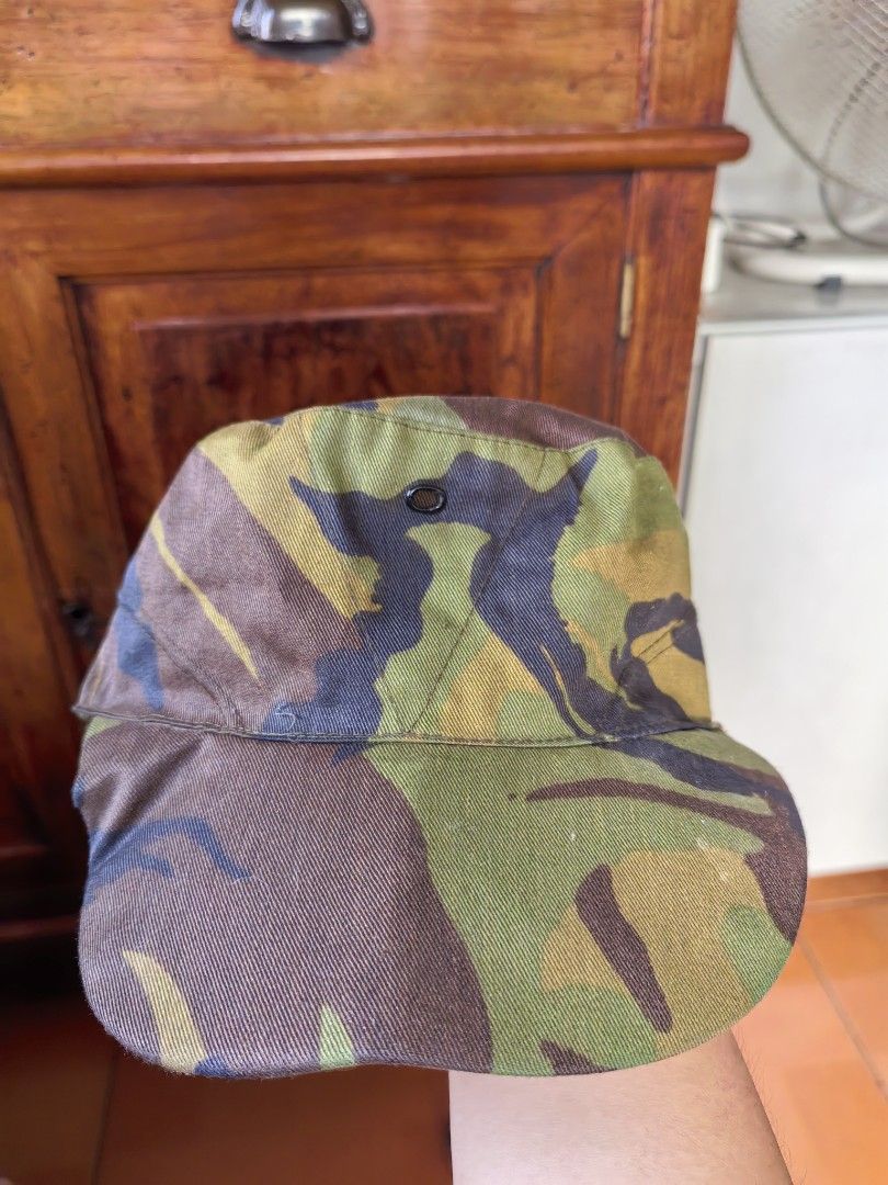 British Army/Military DPM Field Cap (Category: Caps & Hats) located in Navotas City. Submitted by zvz719 (Listing ID 1467898982, Image 1). Description: Hat itself is not faded but the plastic visor is folded and disintegrating. Size 60 cm or 7 3/8 in.