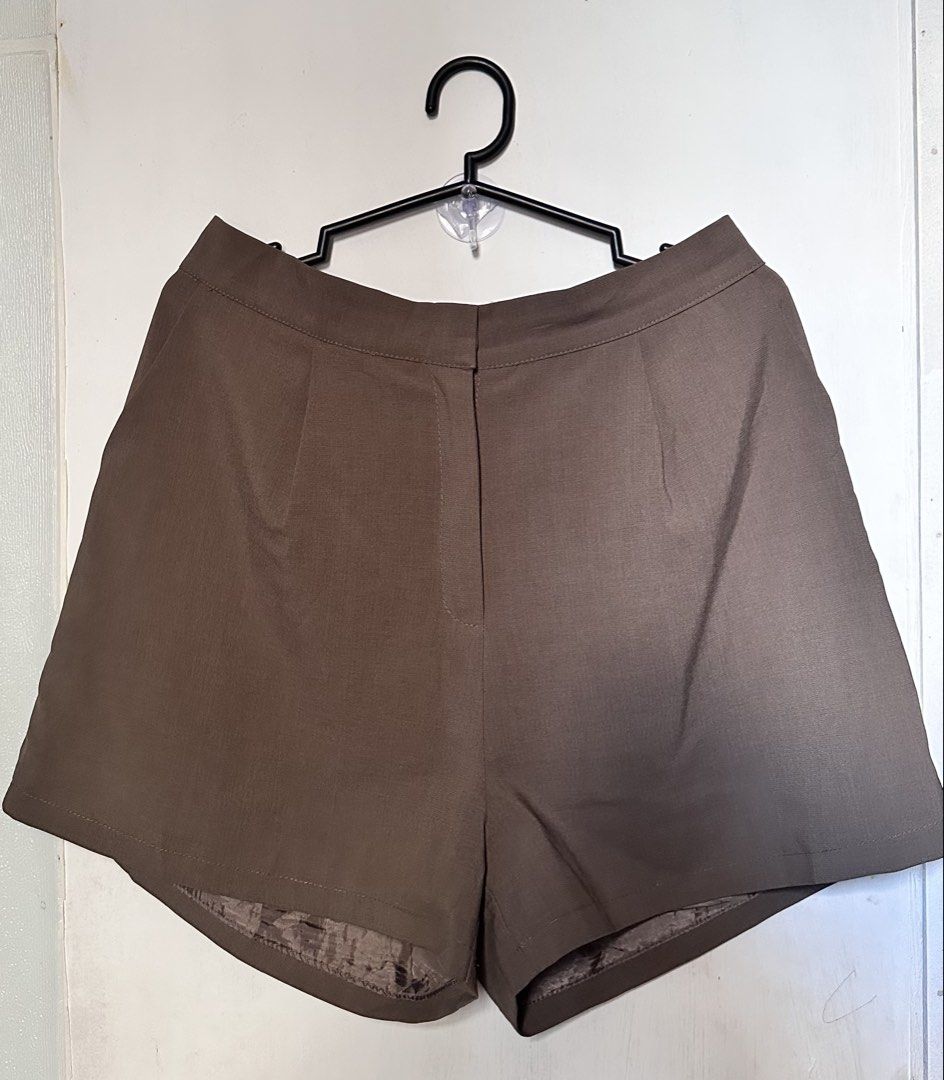 Brown high waist trouser short (Category: Shorts) located in Cavite. Submitted by chicfinds.slay (Listing ID 1467931458, Image 1). Description: ✨doublelining/premium quality ✨best fit size 28-30 waistline ✨length (haba) ✨w/semi garterized waistline a bit stretchable /see pictures.
