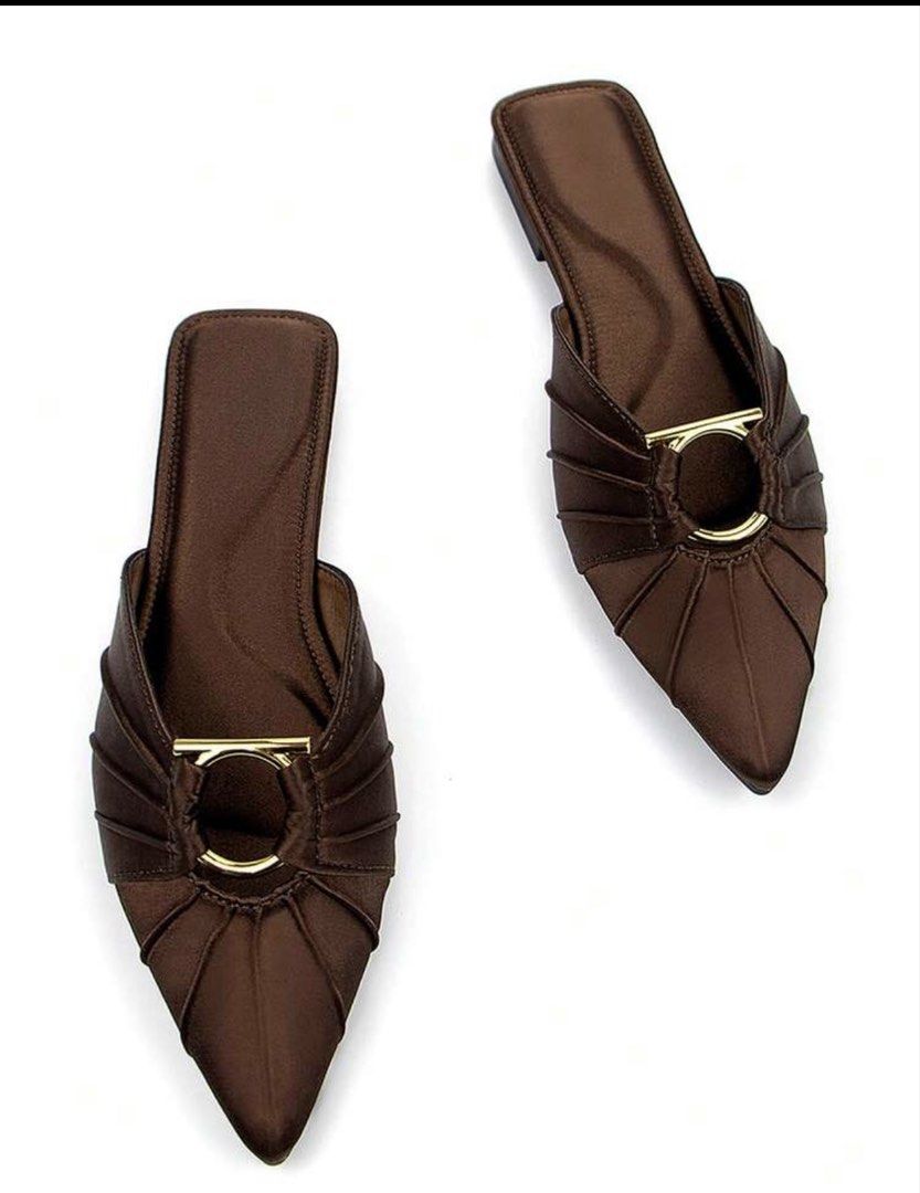 Brown Satin Pointed Toe Flat Mules with Gold Hardware (Category: Flats & Sandals) located in Taguig. Submitted by restyle.mn (Listing ID 1467850010, Image 2). Description: - Rich brown satin finish with elegant pointed toe - Unique pleated fabric design with a stylish gold-tone metal ring detail - Easy slide-on flat sole for all-day comfort - Dark brown inner lining Size 7.