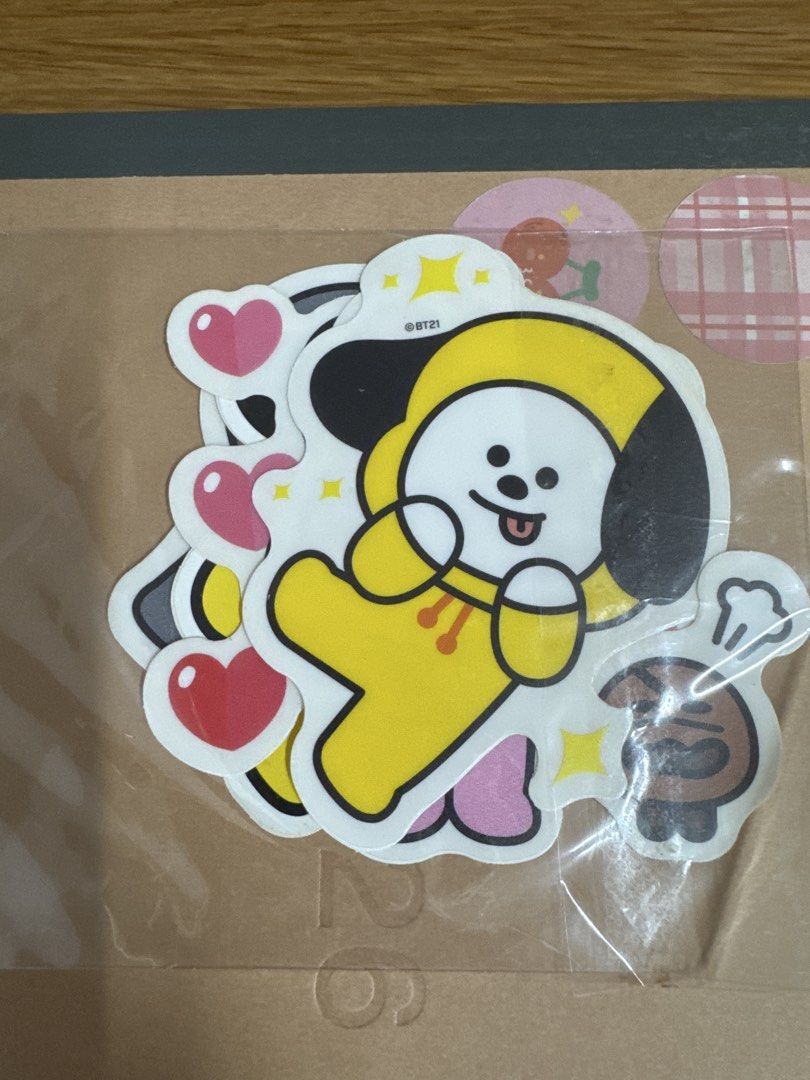 BT21 sticker pack (original) (Category: Designer & Blind Box Toys) located in Manila. Submitted by kaiahs.preloved (Listing ID 1467849752, Image 1). Description: - Official BT21 sticker pack featuring Chimmy in a yellow hoodie - Includes cute heart accents and a small brown character - Brand new and still sealed in original packaging - Perfect for decorating laptops, phone cases, and notebooks - Grab them before they're gone!.