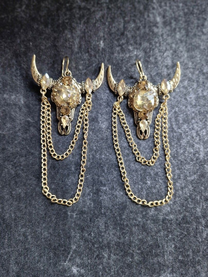Bull Earrings (Category: Earrings) located in Taguig. Submitted by mommaschoice (Listing ID 1467853522, Image 1). Description: Brand New Lightweight Adorned w/rhinestones Dangling earrings Ships nationwide.