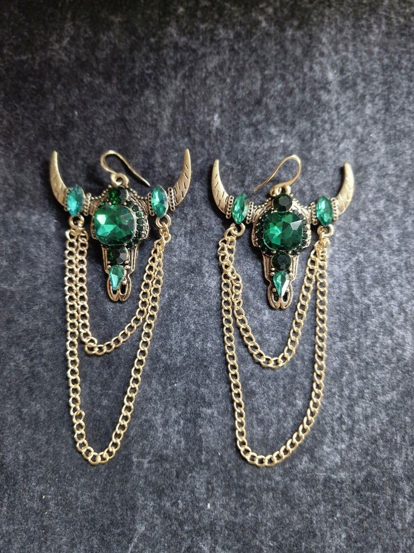 Bull Earrings (Category: Earrings) located in Taguig. Submitted by mommaschoice (Listing ID 1467853718, Image 1). Description: Brand New Lightweight Adorned w/green rhinestones Dangling earrings Ships nationwide.
