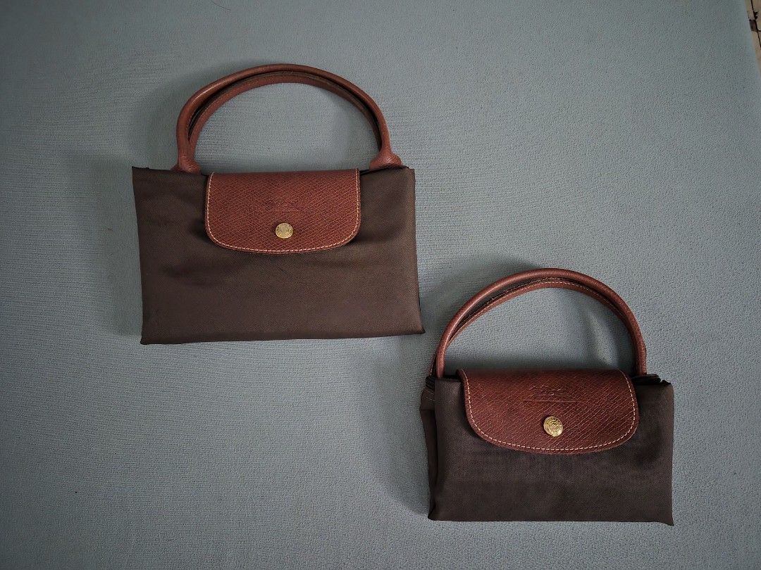 [Bundle] Longchamp Le Pliage Brown Tote Bag Set (2 Sizes) (Category: Tote Bags) located in Quezon City. Submitted by gbabesy2.0 (Listing ID 1467869163, Image 2). Description: - Set of 2 Longchamp Le Pliage short handle bags in classic olive green - Includes one large travel-size tote and one smaller handbag - Durable nylon body with iconic brown leather handles and flap closure - Secure zip top with snap button fastening - Convenient foldable des