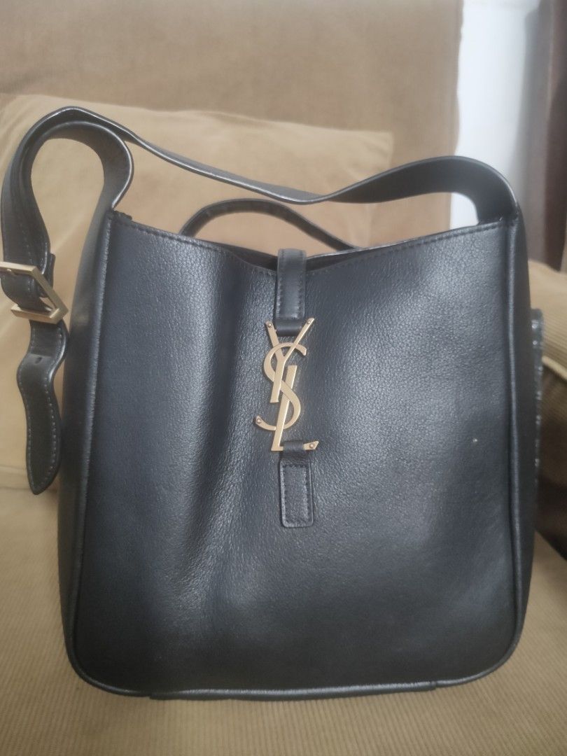 Bundle sale... Ysl and karl lagerfield (Category: Shoulder Bags) located in Manila. Submitted by sarahlopez8117 (Listing ID 1467930808, Image 2). Description: bundle sale ysl hobo bag like new original karl lagefield bag with flaws due to storage ( with hang tag ) selling it for bundle price.