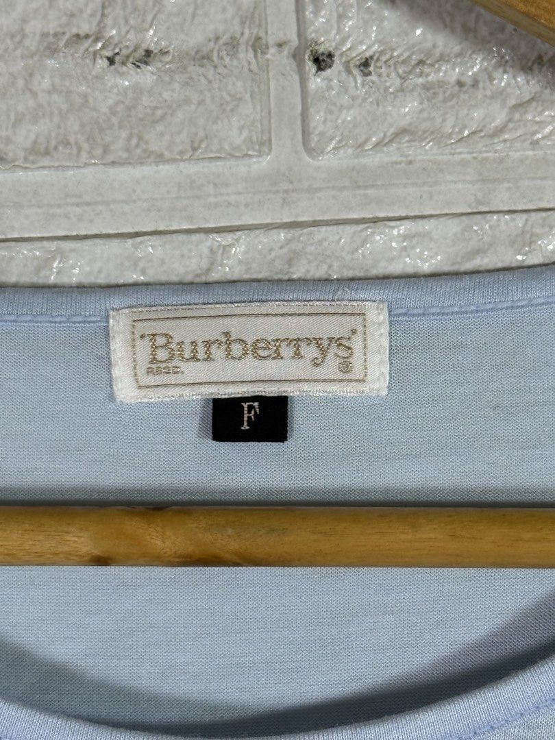 Burberry (Category: Tshirts & Polo Shirts ) located in Quezon City. Submitted by dailyfits08 (Listing ID 1467889310, Image 3). Description: Burberry Vintage Center logo shirt Size F 20.5x24 .