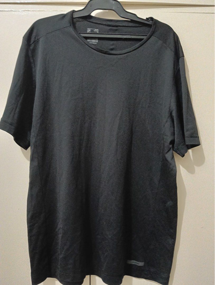 Burberry Black T-Shirt (Category: Shirts) located in Manila. Submitted by goddesssy (Listing ID 1467839912, Image 3). Description: - Brand: Burberry - Item: Black T-shirt with large chest logo - Size: L - Origin: Made in Vietnam - Neckline: Classic crew neck - Condition: Excellent / Ready to wear - Style: Versatile, easy to style for casual everyday looks.