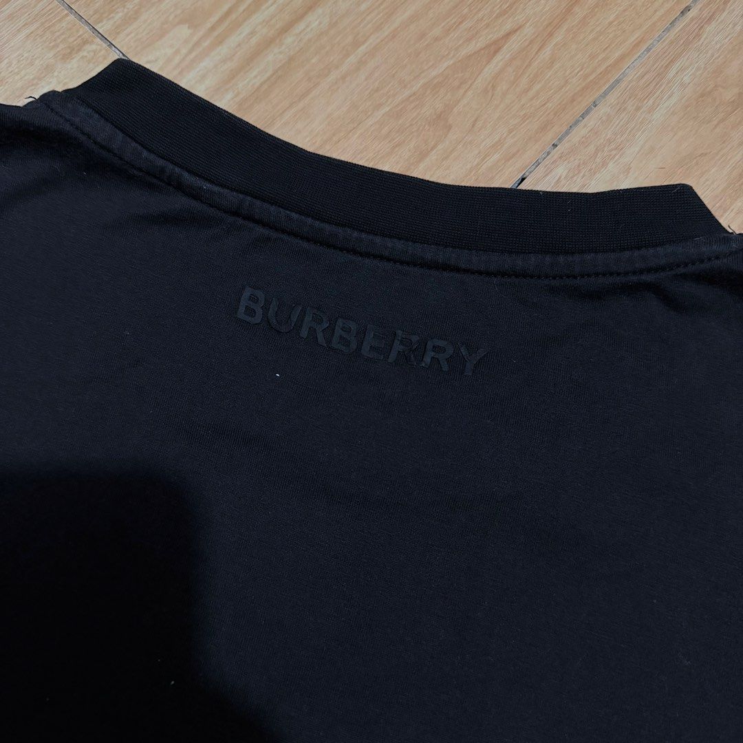 Burberry Black T-Shirt with Ghost Patch (Category: Shirts) located in Angeles City. Submitted by gooddealsbytey (Listing ID 1468007764, Image 3). Description: Width: 23 | Length: 27.5 Off/Legit.