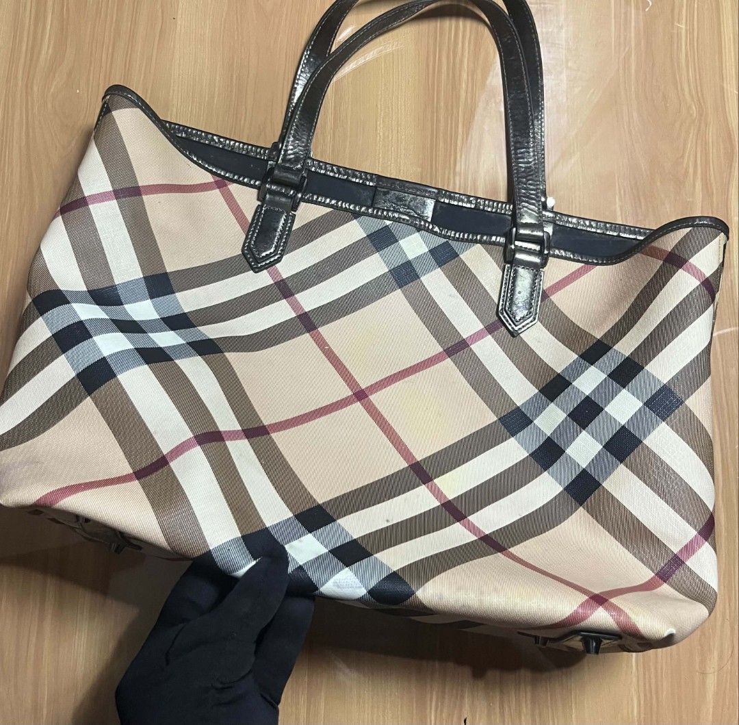 Burberry Check Tote Bag (Category: Tote Bags) located in Manila. Submitted by senggggg. (Listing ID 1468028694, Image 2). Description: good condition working zip sign of use and stain issue check details and size.