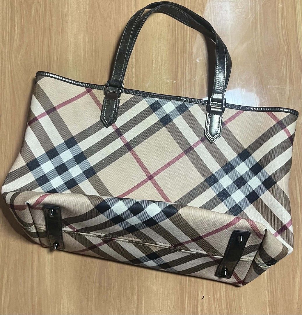 Burberry Check Tote Bag (Category: Tote Bags) located in Manila. Submitted by senggggg. (Listing ID 1468028694, Image 3). Description: good condition working zip sign of use and stain issue check details and size.