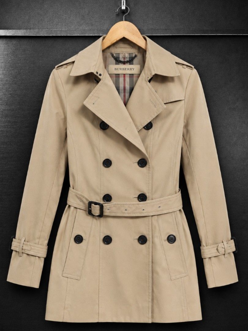 Burberry Double-Breasted Trench Coat Beige (Category: Coats, Jackets and Outerwear) located in Manila. Submitted by urbanfindsbaguio2600 (Listing ID 1467967451, Image 1). Description: BURBERRY COAT EXCELLENT CONDITION COMPLETE WITH BELT BUTTONS MARKED SMALL TO MEDIUM WOMENS COMPLETE TAGS 1500.
