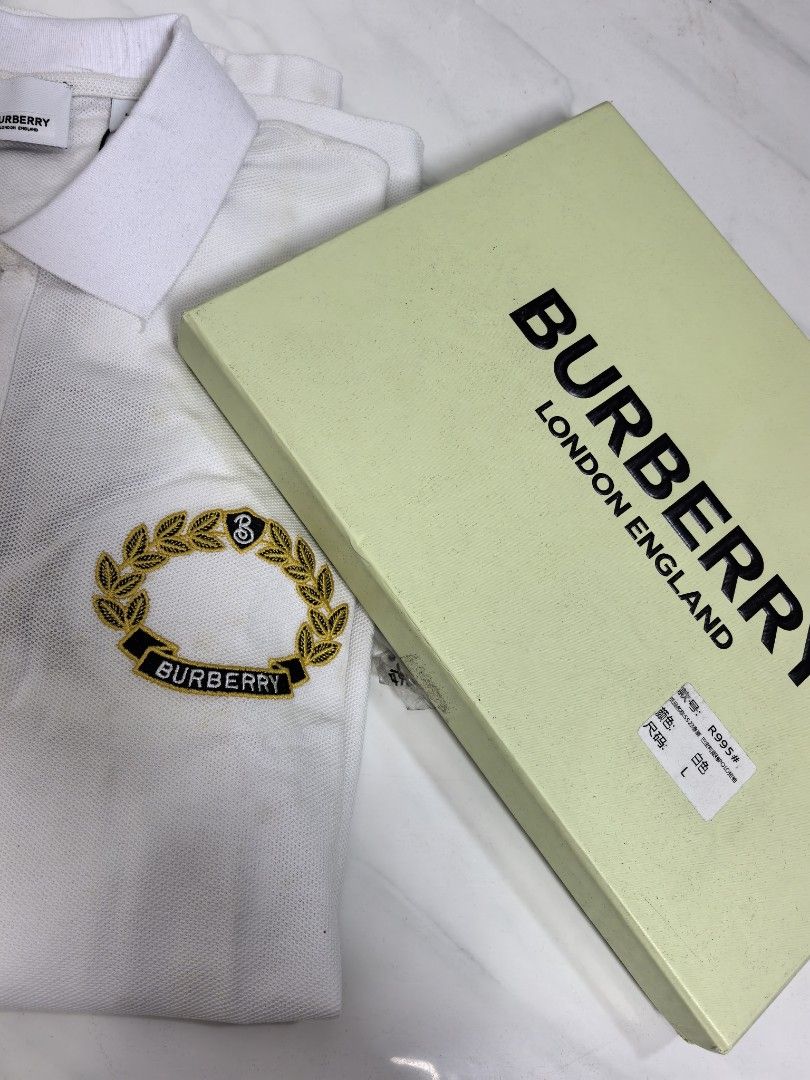 Burberry polo shirt (Category: Luxury Apparel) located in Baguio. Submitted by ashzachary (Listing ID 1467961966, Image 2). Description: Burberry polo shirt Condition :Excellent condition Color rate 10/10 Size :large Inches:W22/30 No issues No flaws Super ganda sa personal Pm. More details Good quality Plsss 📌No Bogus 📌No return MOP What you see is what you get PALAWAN, CEBUNA GCASH AND BDO Reminder😊 We're selling thrifted clothes so please ma