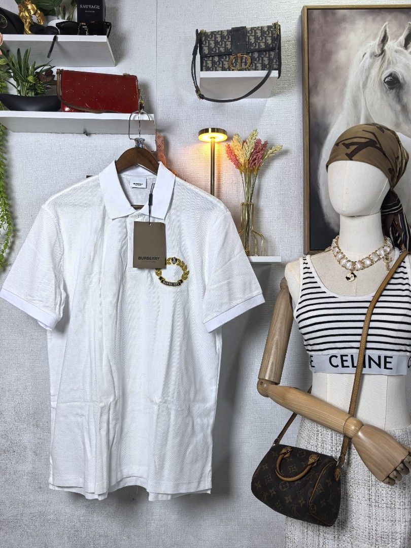 Burberry polo shirt (Category: Luxury Apparel) located in Baguio. Submitted by ashzachary (Listing ID 1467961966, Image 3). Description: Burberry polo shirt Condition :Excellent condition Color rate 10/10 Size :large Inches:W22/30 No issues No flaws Super ganda sa personal Pm. More details Good quality Plsss 📌No Bogus 📌No return MOP What you see is what you get PALAWAN, CEBUNA GCASH AND BDO Reminder😊 We're selling thrifted clothes so please ma