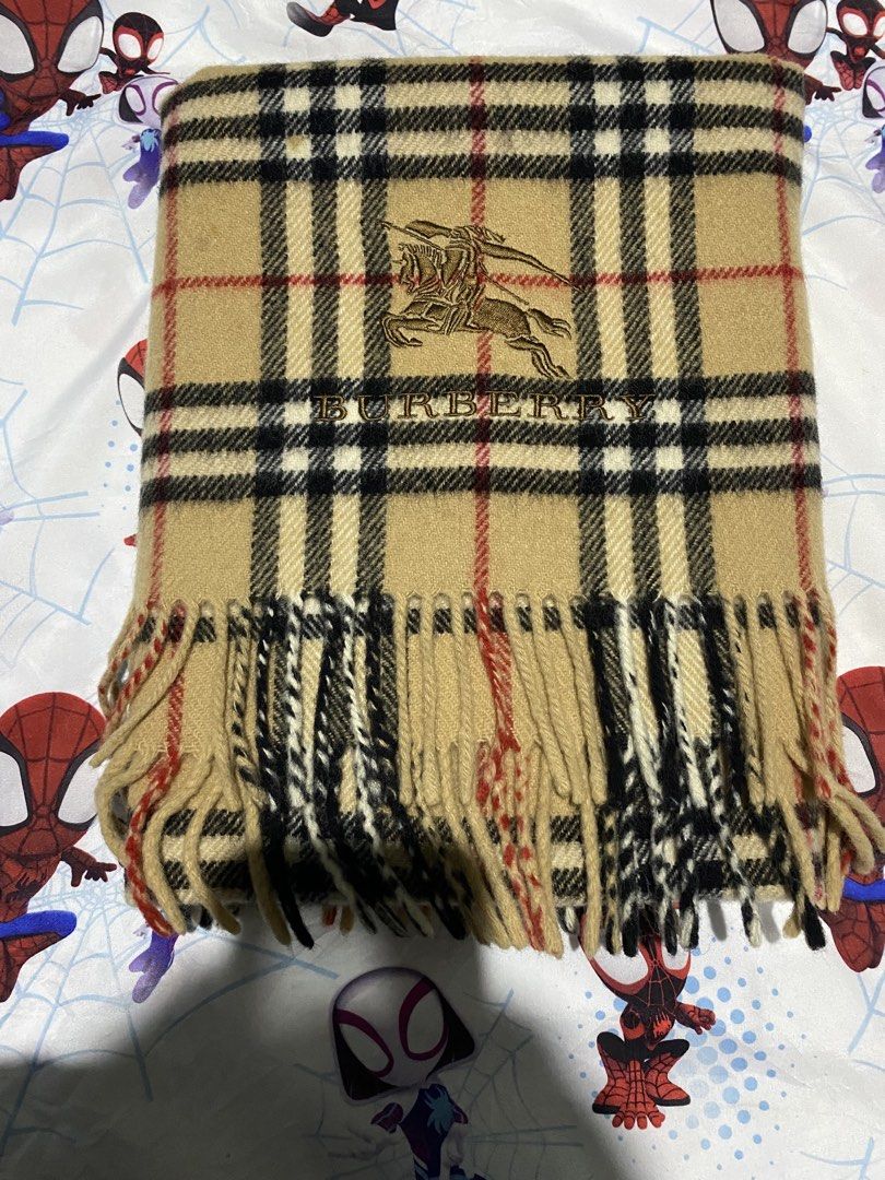 Burberry Scarf Plaid (Category: Scarves) located in Alicia. Submitted by adorable-de (Listing ID 1467893547, Image 2). Description: Burberry Scarf Plaid Excellent condition as new need wash fresh on bale pa mga bossing embroidery big logo siya no issue madumi lang wash lang kulang. No Hole No Scratches Solid na Solid Ganda nito mga bossing amo Complete tags 1250 free shipping .