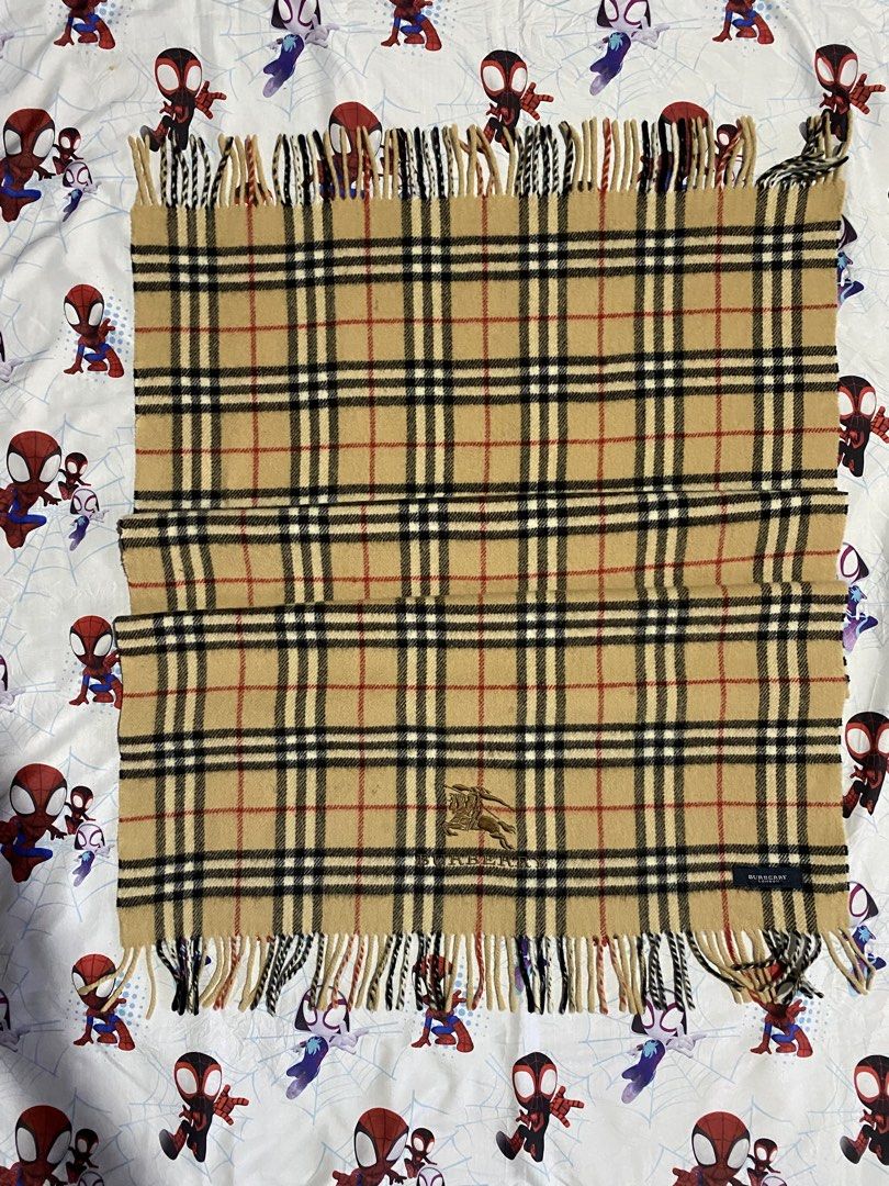 Burberry Scarf Plaid (Category: Scarves) located in Alicia. Submitted by adorable-de (Listing ID 1467893547, Image 1). Description: Burberry Scarf Plaid Excellent condition as new need wash fresh on bale pa mga bossing embroidery big logo siya no issue madumi lang wash lang kulang. No Hole No Scratches Solid na Solid Ganda nito mga bossing amo Complete tags 1250 free shipping .