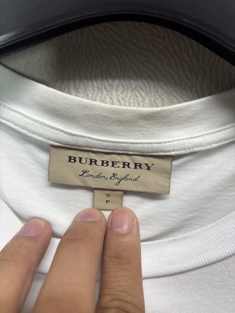 Burberry Shirt (Category: Shirts) located in Baybay. Submitted by thrift.ed2023 (Listing ID 1468020644, Image 3). Description: Burberry Shirt Womens Small to Medium 18x23 No Issue Need Wash Good as New.