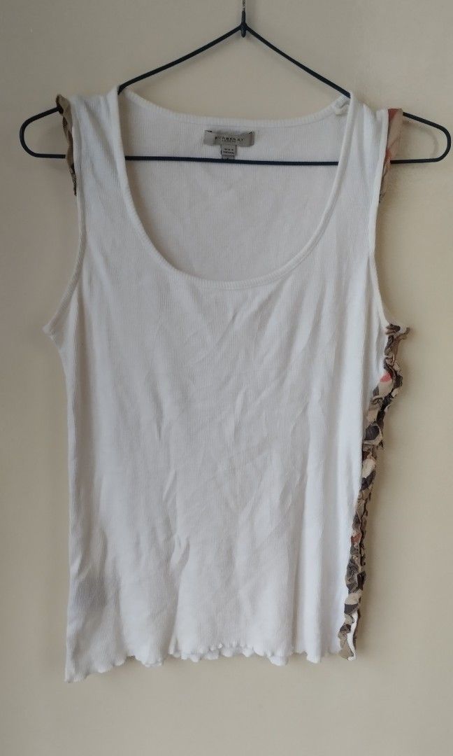 Burberry Sleeveless (Category: Sleeveless) located in General Santos City (Dadiangas). Submitted by fastfish_4e91c5 (Listing ID 1467931165, Image 1). Description: Width 16 Length 23 no issue.