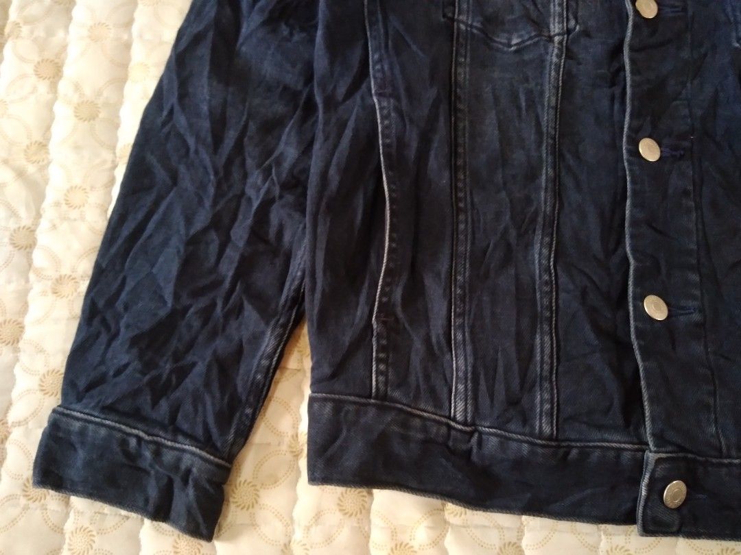 Calvin Klein Denim Trucker Jacket (Category: Coats, Jackets and Outerwear) located in Zamboanga. Submitted by zhumhazhav (Listing ID 1467889259, Image 3). Description: Tag size small Width 20 Length 25 Shoulder 17.5 Sleeve 24 Dark blue color way Spandex/Stretchable fabric Excellent condition Presentable,no flaws Check all photos for details 1450+shipping fee.