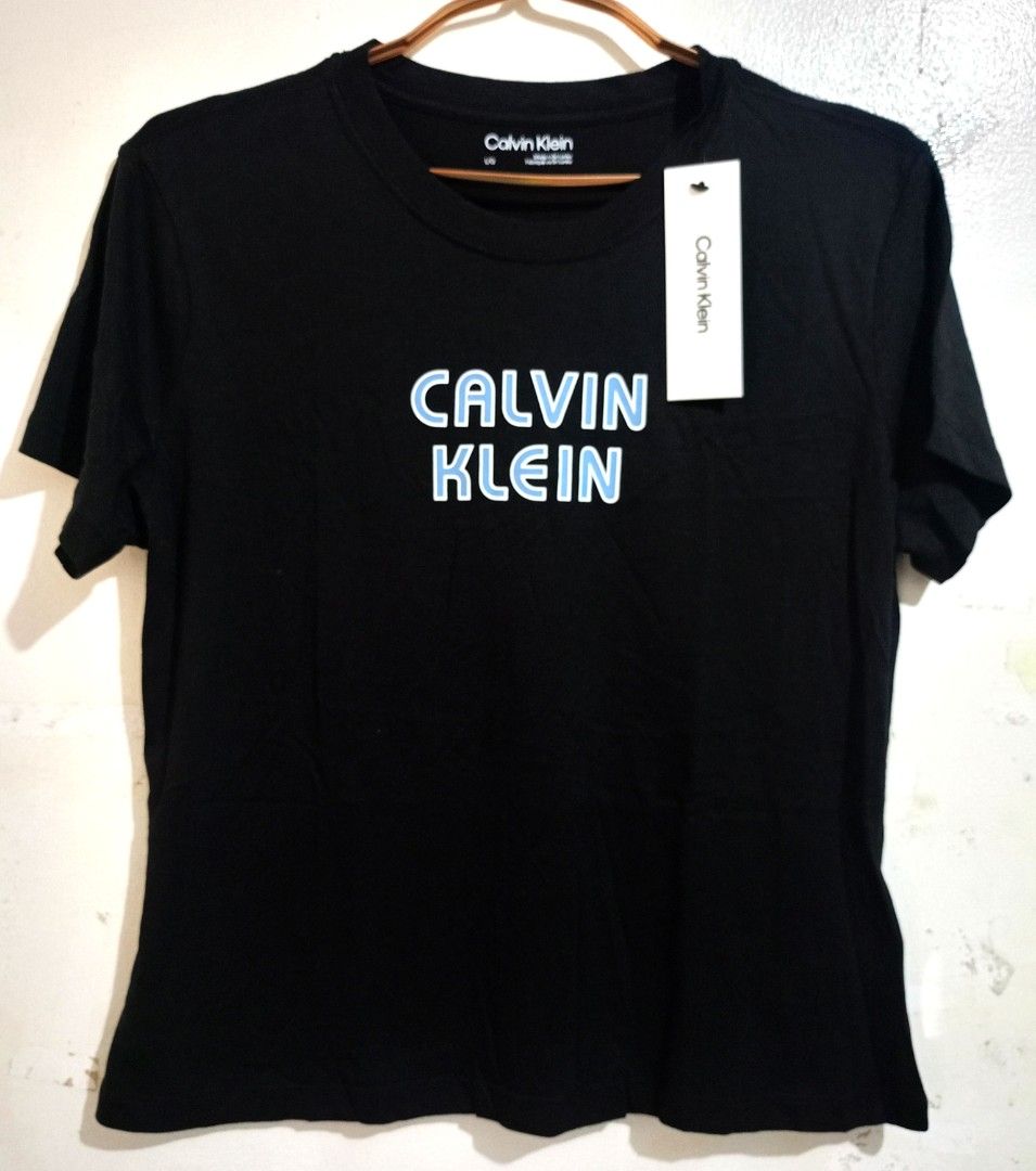 Calvin Klein Lrg (Category: Shirts) located in Las Pinas. Submitted by vanitystorehouse (Listing ID 1467903501, Image 1). Description: * brand new with tag; for women * bought in US * width 20 inches.