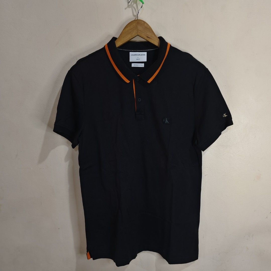 CALVIN KLEIN POLO SHIRT (Category: Tshirts & Polo Shirts ) located in Bulacan. Submitted by markkiethrift2023 (Listing ID 1467971503, Image 1). Description: CALVIN KLEIN POLO SHIRT EXCELLENT CONDITION DIMES: 19 x 28.