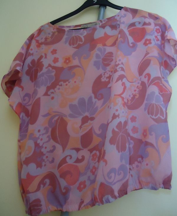 CALYPSO PASTEL PEACH PINK BLOUSE (Category: Blouses) located in Marikina City. Submitted by minimalistmanila (Listing ID 1467870127, Image 2). Description: Calypso pastel pink peach chiffon blouse. Fits medium. Order now! .