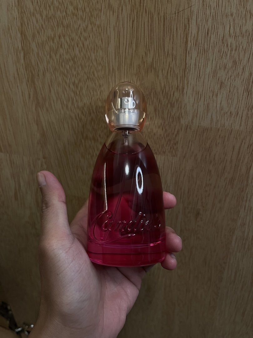Candie's Berrylicious Eau De Parfum 100ml (Category: Fragrance & Deodorants) located in Imus. Submitted by graeyowl (Listing ID 1468047977, Image 3). Description: For sale or trade to other perfumes - Brand: Candie's - Fragrance: Berrylicious (Sweet berry, fruity scent) - Size: Big 100ml bottle - Condition: Like new, sprayed only a couple of times to test (bottle is basically full) - Packaging: Includes original pink box with minor shelf wear on 