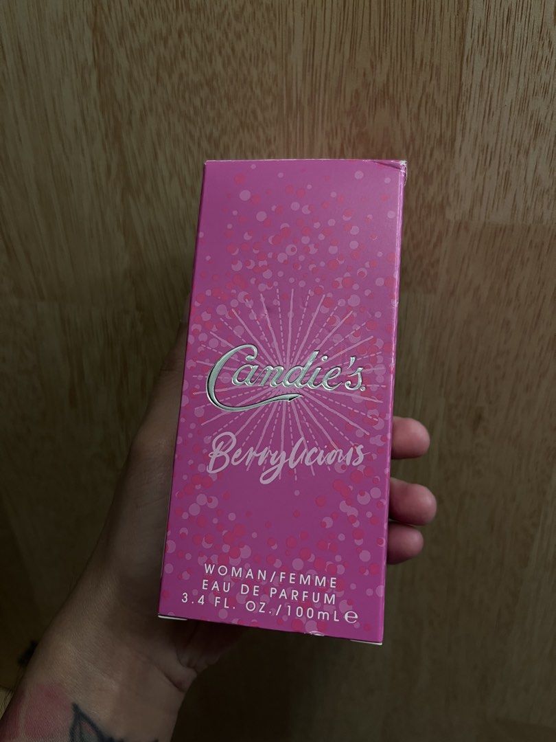 Candie's Berrylicious Eau De Parfum 100ml (Category: Fragrance & Deodorants) located in Imus. Submitted by graeyowl (Listing ID 1468047977, Image 1). Description: For sale or trade to other perfumes - Brand: Candie's - Fragrance: Berrylicious (Sweet berry, fruity scent) - Size: Big 100ml bottle - Condition: Like new, sprayed only a couple of times to test (bottle is basically full) - Packaging: Includes original pink box with minor shelf wear on 