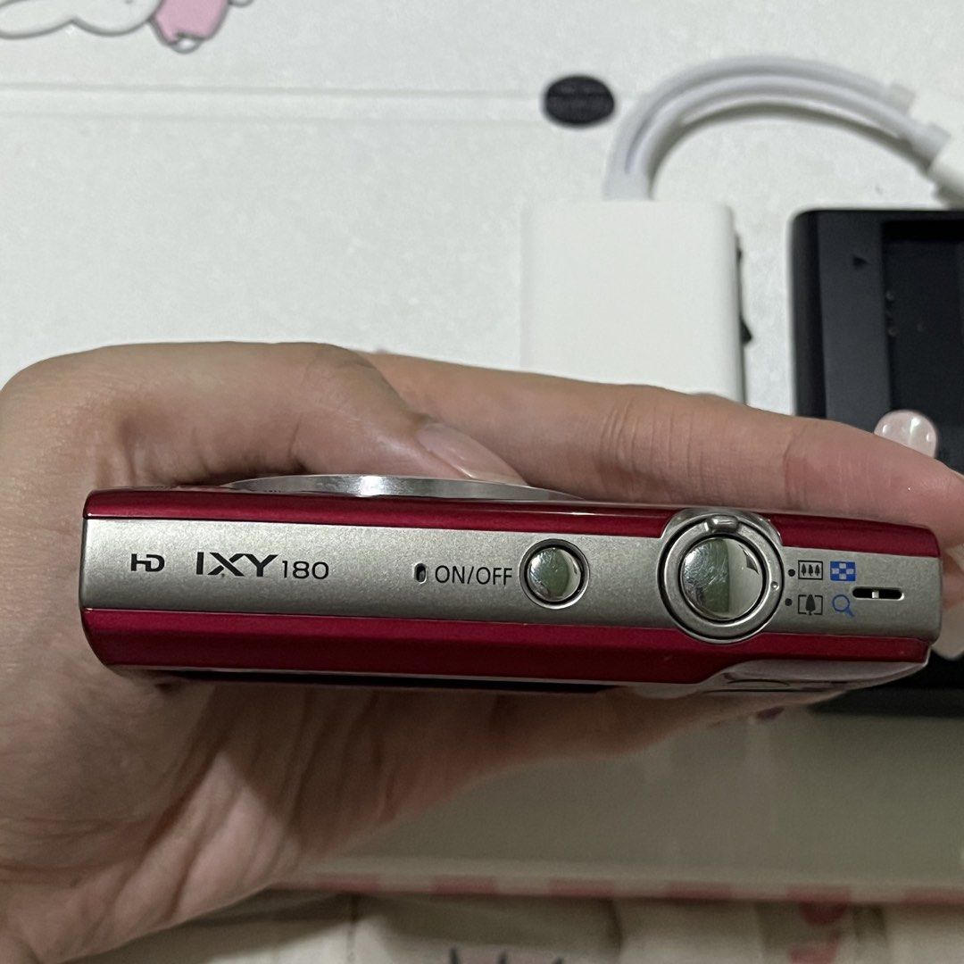 Canon IXY 180 Digital Camera (Category: Cameras) located in Manila. Submitted by happyshark-9064 (Listing ID 1467915823, Image 3). Description: - Model: Red Canon IXY 180 compact digital camera (sample pics last slides) - bought for 12k - RFS: upgrading (no issues and used very light) - Condition: Excellent, minimal signs of handling with a clean screen and responsive buttons - Functionality: Fully tested and powers on - Inclusions: Battery pack 