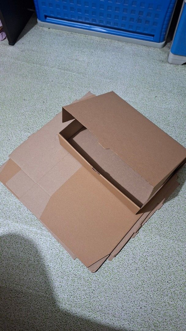 Cardboard mailer boxes (Category: Craft Supplies & Tools) located in Manila. Submitted by daisythejane (Listing ID 1467987033, Image 2). Description: - Sturdy brown corrugated cardboard boxes - Unfolded and neatly stacked for easy storage and space-saving - Made from strong material, ideal for shipping, packing, or organizing - size: 13" x 9.5" x 3" take all: 7 pcs.