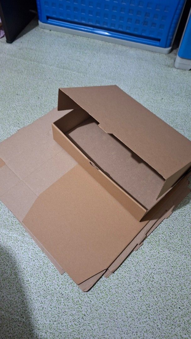 Cardboard mailer boxes (Category: Craft Supplies & Tools) located in Manila. Submitted by daisythejane (Listing ID 1467987033, Image 1). Description: - Sturdy brown corrugated cardboard boxes - Unfolded and neatly stacked for easy storage and space-saving - Made from strong material, ideal for shipping, packing, or organizing - size: 13" x 9.5" x 3" take all: 7 pcs.