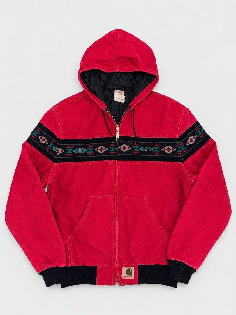 Carhartt Aztec Pattern Active Jacket Red (Category: Coats, Jackets and Outerwear) located in Santa Rosa. Submitted by n.vallermosa (Listing ID 1468039494, Image 1). Description: - Authentic red Carhartt active jacket - Eye-catching Aztec pattern design on chest and back - Heavy canvas construction to block out the wind - Full zip front with branded metal pull - Attached hood and front pouch pocket - Ribbed black cuffs and hem for a snug fit - Ico