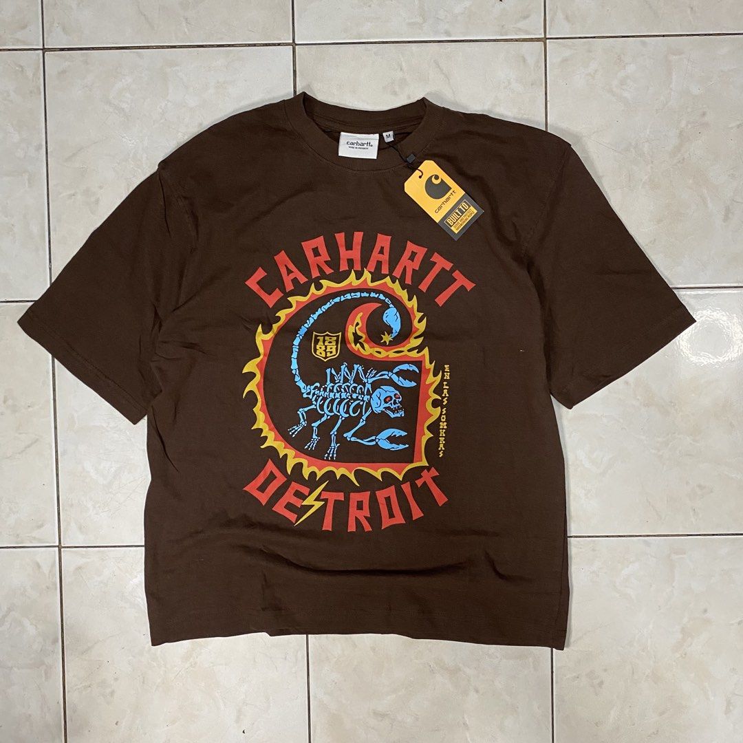 Carhartt Detroit (Category: Activewear) located in Bacoor. Submitted by fitcart (Listing ID 1467869200, Image 1). Description: Size: M Dimensions: 27 × 20 Fabric: Cotton Condition: Good Condition Color Rate: 9/10 Issue: Minor print mark Price: ₱350 📩 CLAIM: PM TO CLAIM.