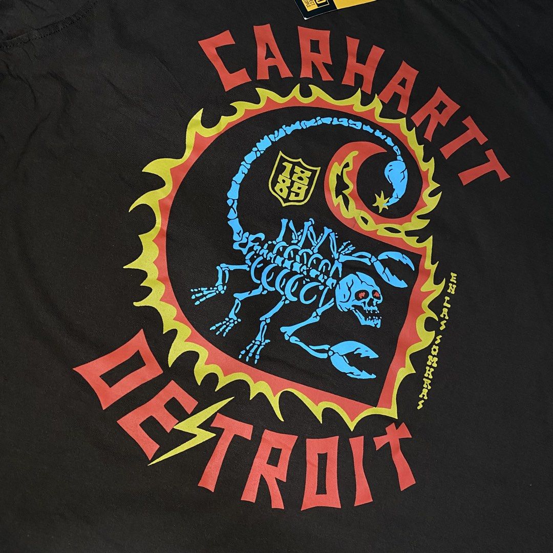 Carhartt Detroit (Category: Activewear) located in Bacoor. Submitted by fitcart (Listing ID 1467869200, Image 2). Description: Size: M Dimensions: 27 × 20 Fabric: Cotton Condition: Good Condition Color Rate: 9/10 Issue: Minor print mark Price: ₱350 📩 CLAIM: PM TO CLAIM.