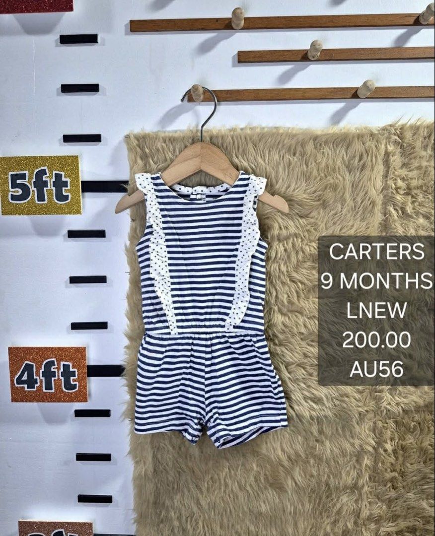 Carter's Blue and White Striped Romper 9 Months (Category: Babies & Kids Fashion) located in Jaen. Submitted by kmg0219 (Listing ID 1468050745, Image 1). Description: - Brand: Carter's - Size: 9 Months - Color/Pattern: Blue and white stripes with polka dot ruffle trim - Style: Sleeveless romper with elasticized waist - Material: Lightweight, breathable fabric perfect for warm weather - Condition: Clean and gently used (Ready to wear!).