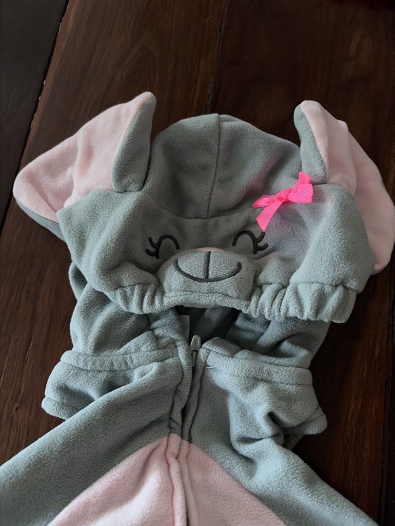 Carter's Elephant Costume Size 24 Months (Category: Babies & Kids Fashion) located in Quezon City. Submitted by yarnhillmanila (Listing ID 1467920076, Image 2). Description: - Brand: Carter's - Size: 24 months - Material: Super soft and warm fleece - Design: Grey elephant with pink belly, ear lining, and a cute little tail - Hood: Attached hood with embroidered face details, pink bow, and floppy ears - Closure: Full front zipper for easy dressing