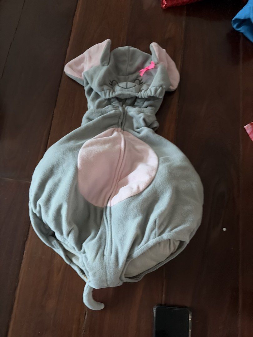 Carter's Elephant Costume Size 24 Months (Category: Babies & Kids Fashion) located in Quezon City. Submitted by yarnhillmanila (Listing ID 1467920076, Image 1). Description: - Brand: Carter's - Size: 24 months - Material: Super soft and warm fleece - Design: Grey elephant with pink belly, ear lining, and a cute little tail - Hood: Attached hood with embroidered face details, pink bow, and floppy ears - Closure: Full front zipper for easy dressing
