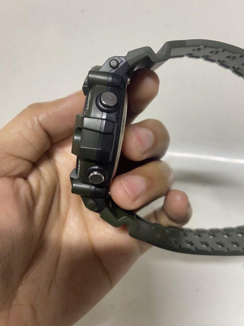Casio AE-1500WH Digital Watch (Category: Women's Watches) located in Pasacao. Submitted by wengpullar37205 (Listing ID 1467890997, Image 2). Description: Casio AE-1500WH digital watch in olive green. Large round digital display with clear digits, day, and date. Resin strap, stainless steel back. Water resistant up to 100 meters. Built with a 10-year battery life, five alarms, and illuminator backlight. Buttons on both sides for adjusting time, li