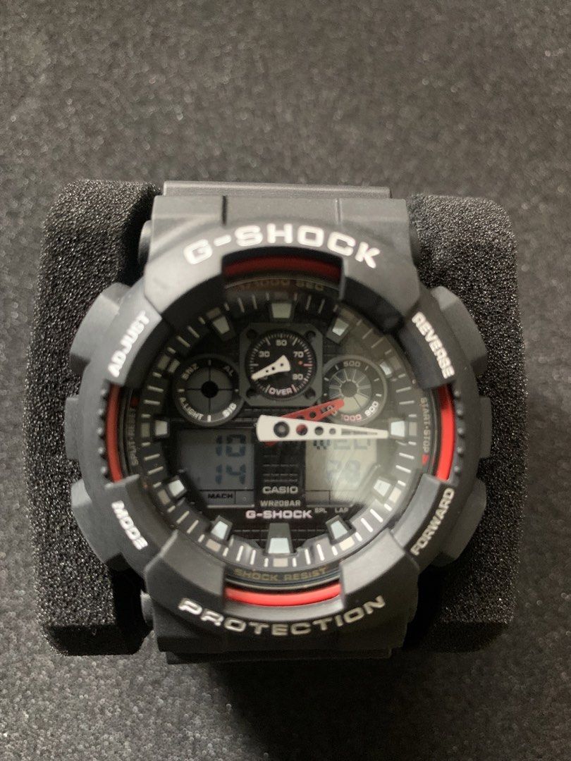 Casio G-Shock GA-100 Black Red Watch (Category: Men's Watches) located in Taytay. Submitted by tropamon_tcg (Listing ID 1467915899, Image 1). Description: Authentic G-Shock Watch GA-100 Brand new replacement bezel and strap (matte black). Brand new battery installed. All buttons and functions working. Please manage expectations. This is a a used item. No warranty. No returns. Open to offers. Location: Taytay, Rizal.