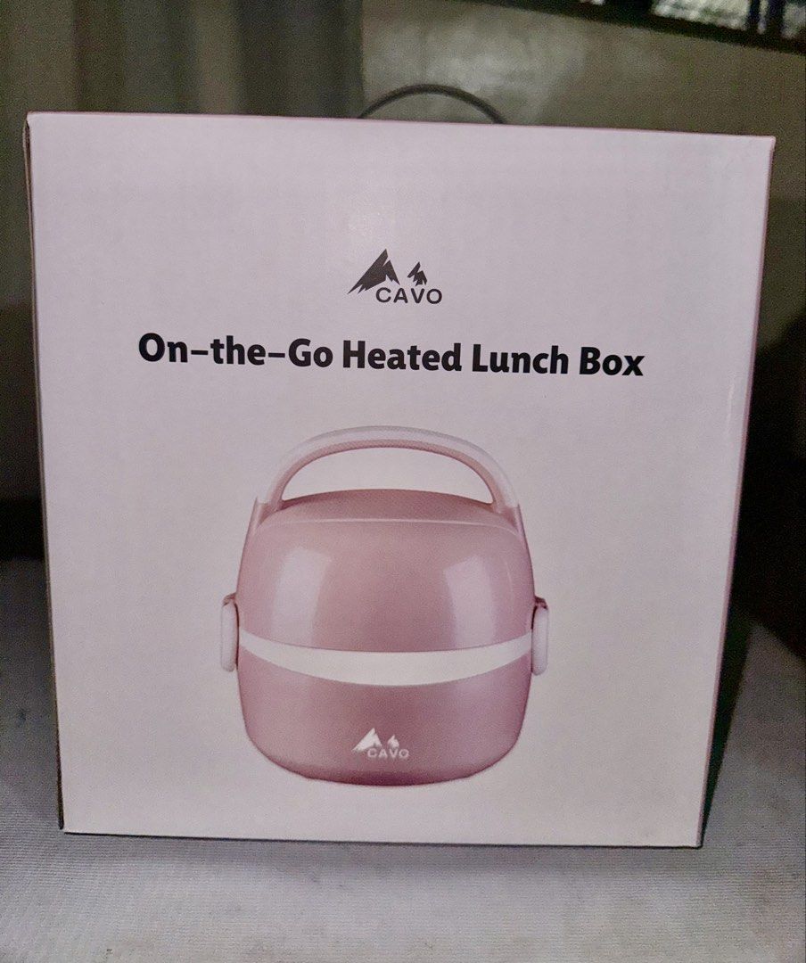 Cavo On-the-Go Heated Lunch Box (Category: Food Organization & Storage) located in Imus. Submitted by silentfire-353921 (Listing ID 1467931773, Image 2). Description: - Color: Pink - Self-heating technology with automatic safety shut-off - Dishwasher-safe removable parts for easy cleaning - Portable design with a sturdy handle and secure latch - Keeps your meals warm anytime, anywhere - Comes with the original box.