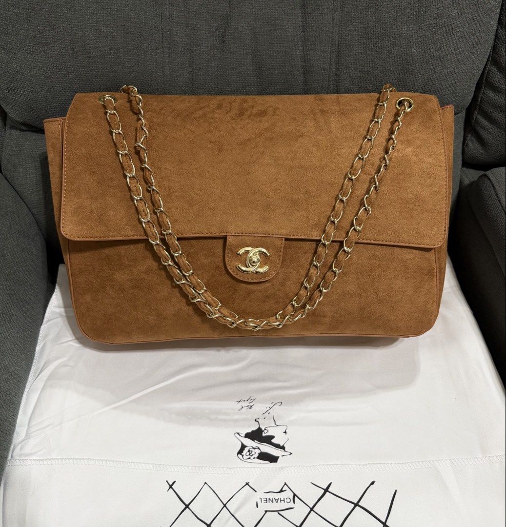 CC Suede Maxi (Category: Shoulder Bags) located in Quezon City. Submitted by chic.bags (Listing ID 1467913067, Image 1). Description: With microcip Leather lining 2 way With dust bag Good as new No issue Actual photo posted Japan preloved Mop: gcash.