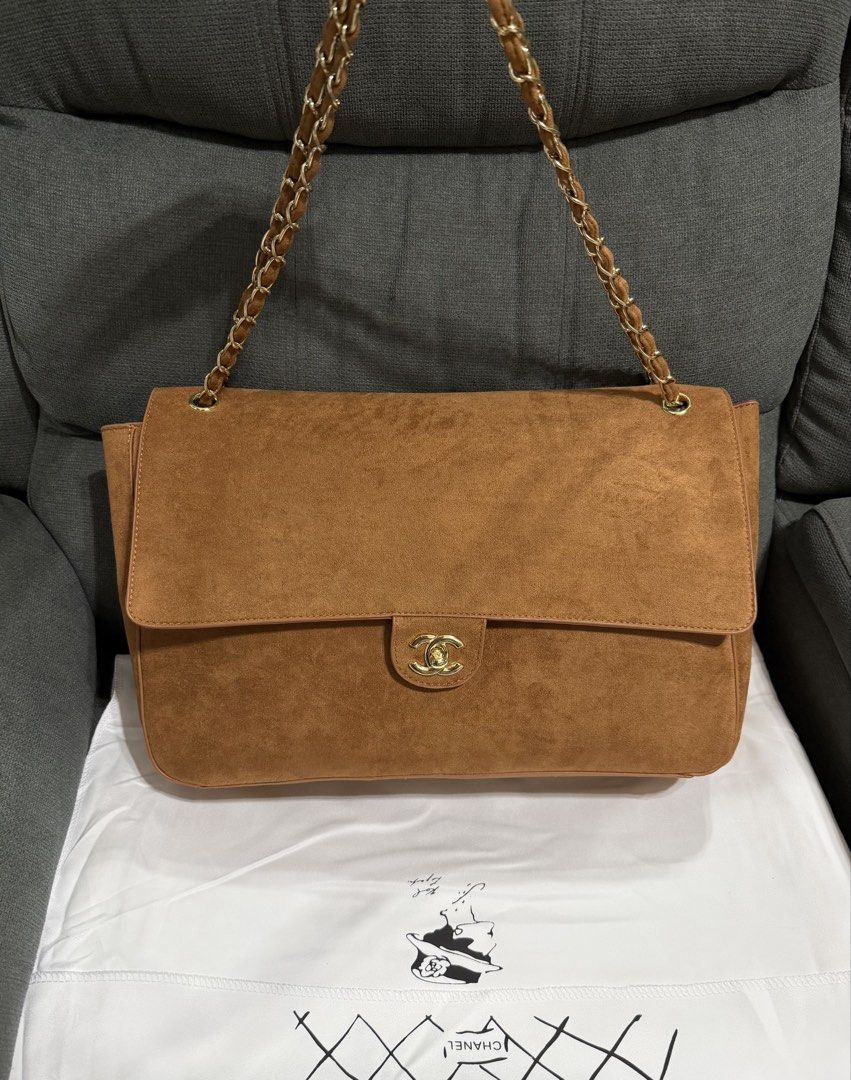 CC Suede Maxi (Category: Shoulder Bags) located in Quezon City. Submitted by chic.bags (Listing ID 1467913067, Image 2). Description: With microcip Leather lining 2 way With dust bag Good as new No issue Actual photo posted Japan preloved Mop: gcash.
