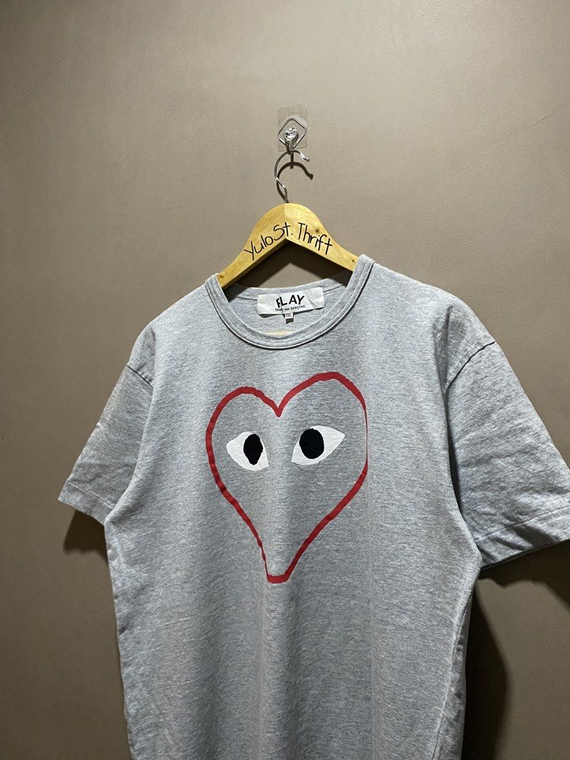 CDG Play (Category: Tshirts & Polo Shirts ) located in Iloilo. Submitted by yulostreet.thrift (Listing ID 1467992253, Image 2). Description: CDG Play Size 2XL on tags Complete tags 22Wx28L Best fit large Features the iconic heart logo print on the front 9.7/10 CR Excellent condition.