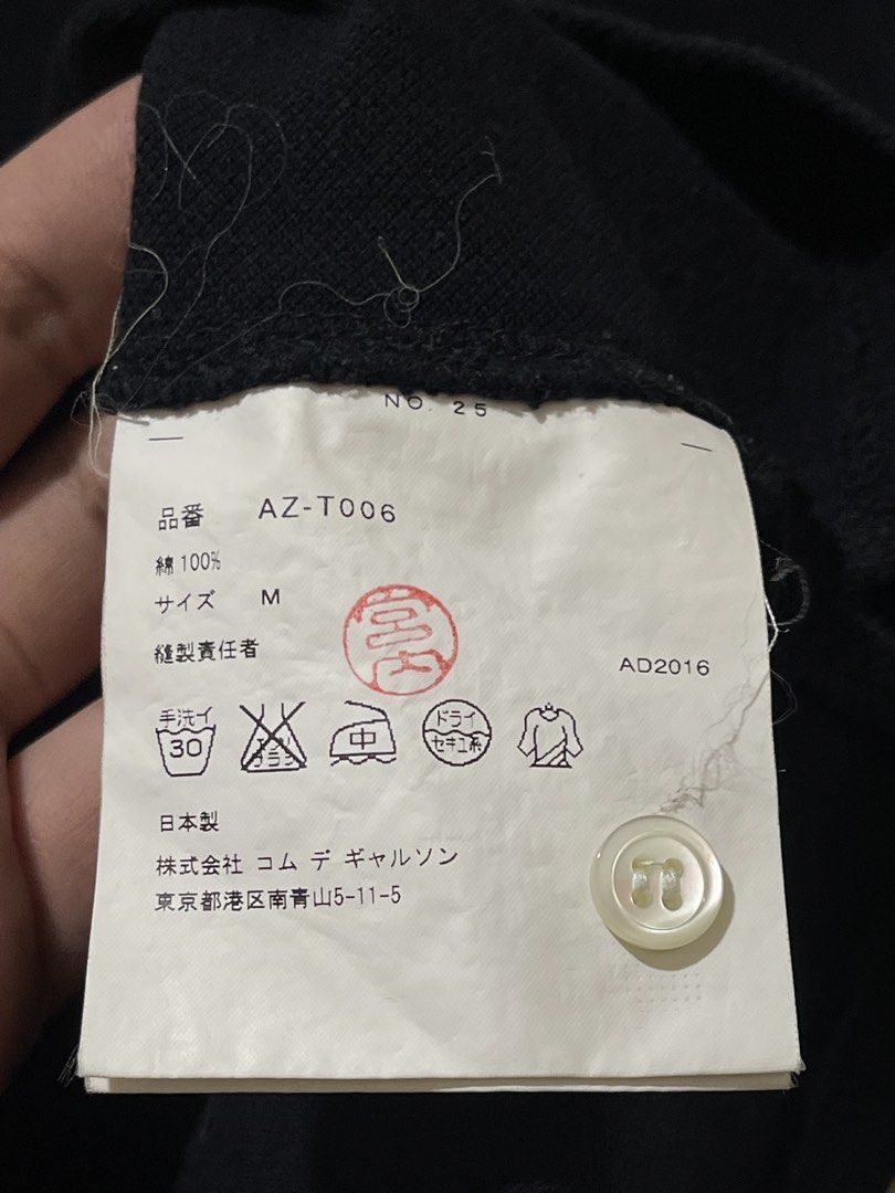 CDG Play polo shirt in Black Authentic (Category: Luxury Apparel) located in Marikina City. Submitted by joshuaades21107 (Listing ID 1468014935, Image 3). Description: Authentic CDG play black polo shirt Medium on tag 19 width 25 length In excellent condition 9.5 color rate .