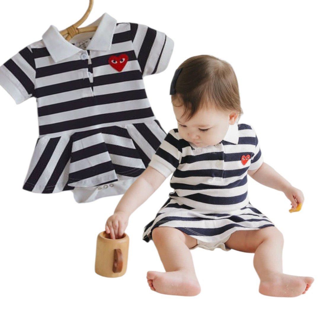 CDG-Inspired Striped Polo Romper — Size 0–6 Months (Category: Babies & Kids Fashion) located in Taguig. Submitted by kocollectibles (Listing ID 1467995082, Image 2). Description: CDG-Inspired Striped Polo Romper — Size 0–6 Months ✨ Item Details - ✅ Style: Cute navy blue & white striped polo romper with iconic red heart eye patch - ✅ Size: 0–6 Months - ✅ Design: Classic collar, button detail at chest, short sleeves - ✅ Note: This is a replica / in